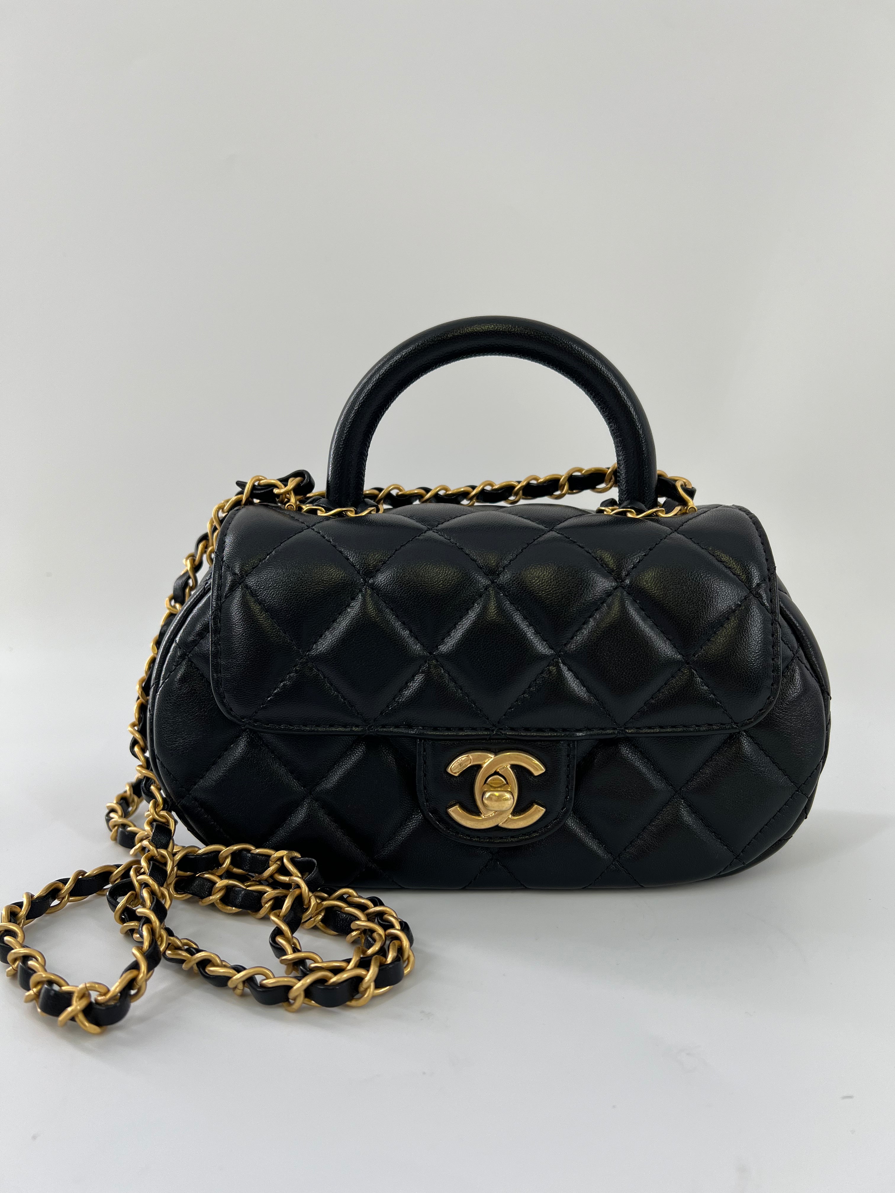 Chanel black sling bag hotsell