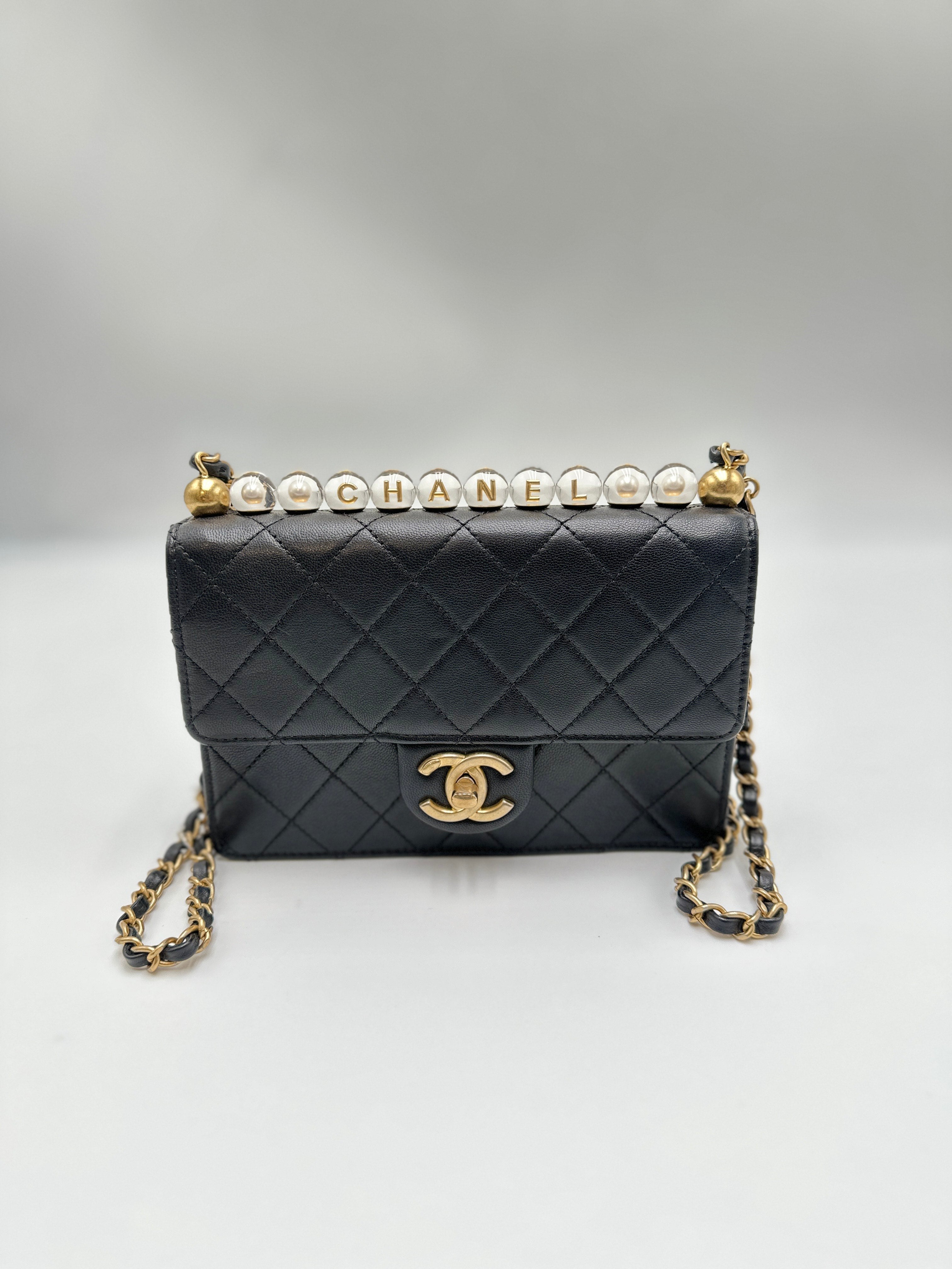 Chanel Pearl Flap Bag Calfskin Black - The Real Maluho